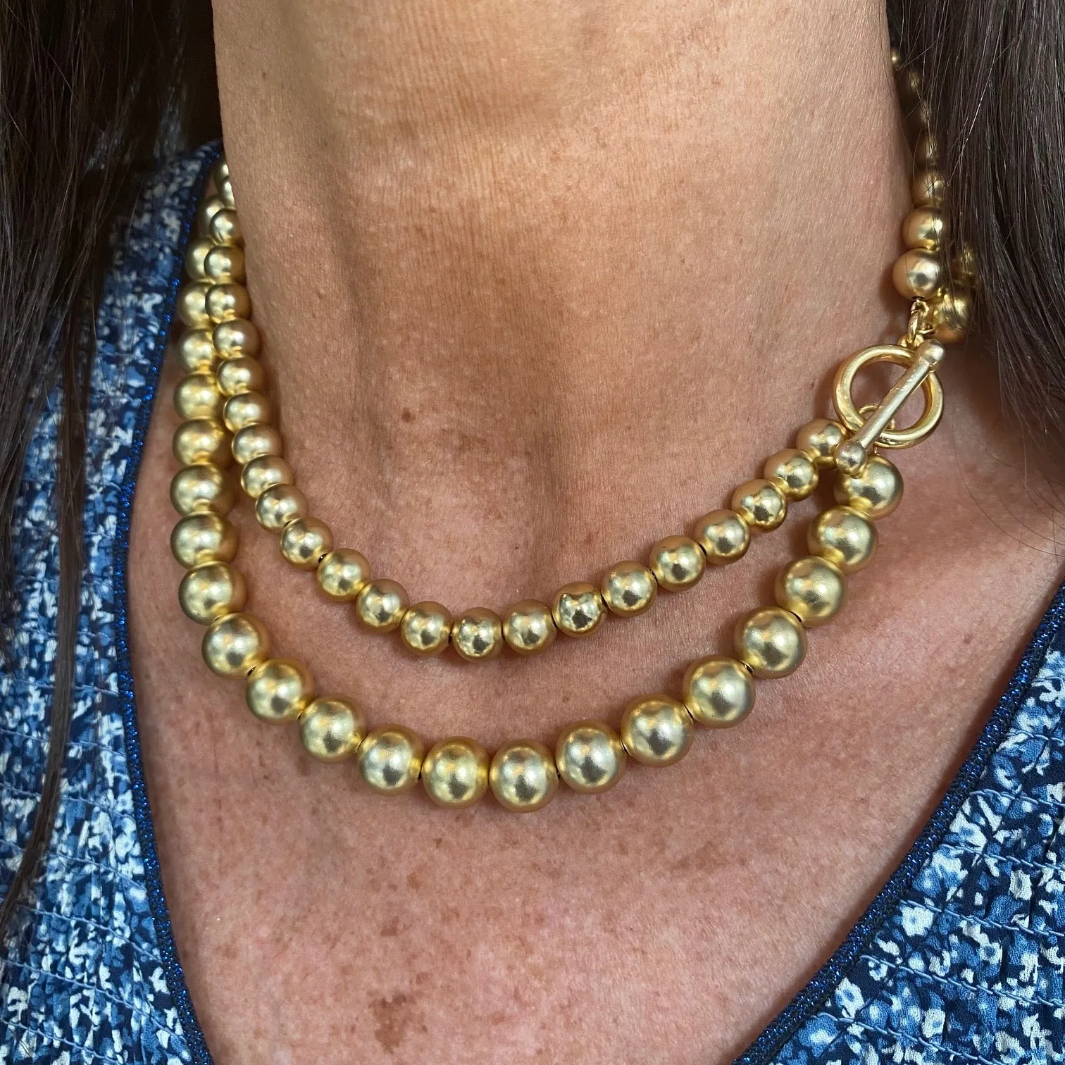 Double layer beaded necklace with side clasp